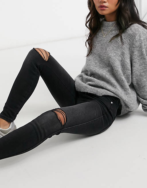 Skinny Jeans With Rips In Black