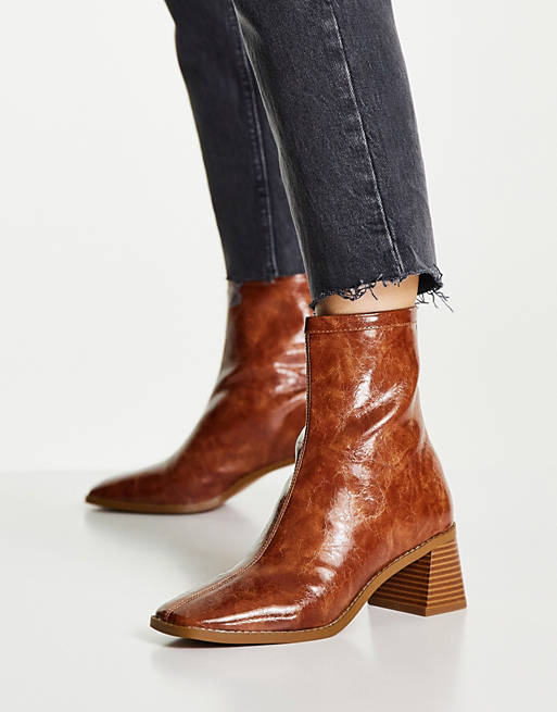 Raider Mid-Heel Ankle Boots In Tan