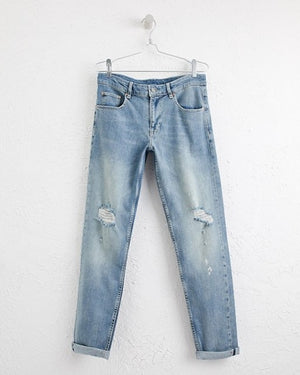 Slim Jeans in Mid Wash Blue with Rips