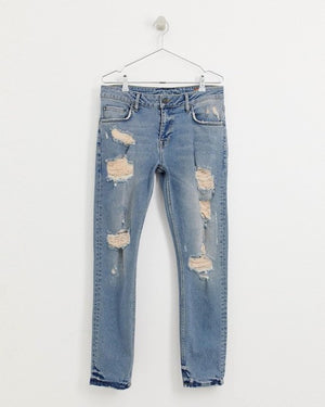 Slim Jeans in Vintage Light Wash Blue with Heavy Rips