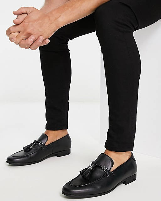 Loafers In Black Faux Leather With Tassel Detail