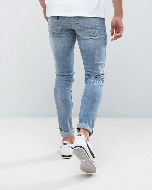 Super Skinny Jeans in Mid Wash Blue with Abrasions